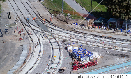 Road construction site with tram tracks repair and maintenance aerial timelapse. Road construction site with tram tracks repair and maintenance aerial timelapse. 142461941