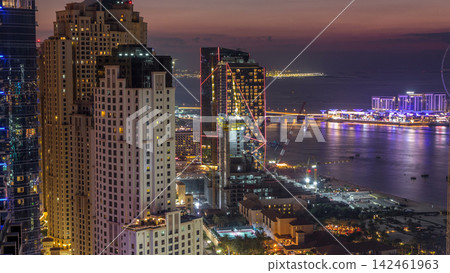 JBR and Dubai marina after sunset aerial day to night timelapse JBR and Dubai marina after sunset aerial day to night timelapse 142461963