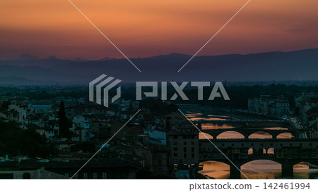 Skyline view of Arno River timelapse. Ponte Vecchio from Piazzale Michelangelo at Sunset, Florence, Italy. Skyline view of Arno River timelapse. Ponte Vecchio from Piazzale Michelangelo at Sunset, Florence, Italy. 142461994