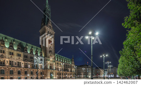 Panorama showing a building of the Hamburg City Hall night timelapse, the seat of the government of Hamburg, Germany 142462007