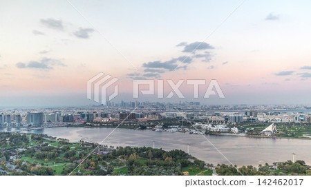 View of new modern city with green trees in luxury Dubai city, United Arab Emirates Timelapse Aerial 142462017