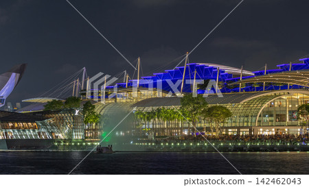 Beautiful laser and musical fountain show at the Marina Bay Sands waterfront in Singapore night timelapse Beautiful laser and musical fountain show at the Marina Bay Sands waterfront in Singapore night timelapse 142462043