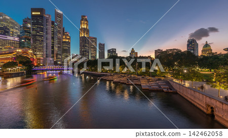 Singapore skyscrapers skyline with white Anderson Bridge near esplanade park day to night timelapse. Singapore skyscrapers skyline with white Anderson Bridge near esplanade park day to night timelapse. 142462058