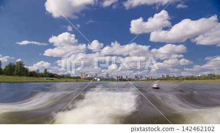 Astana, Kazakhstan. View from Pleasure boat on the river Ishim timelapse hyperlapse drivelapse in Astana. Astana, Kazakhstan. View from Pleasure boat on the river Ishim timelapse hyperlapse drivelapse in Astana. 142462102