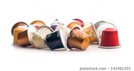 Colorful Coffee Capsules And Pods Scattered On White Background For Single-Serve Espresso Colorful Coffee Capsules And Pods Scattered On White Background For Single-Serve Espresso 142462201