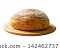 Round of wheat rustic bread with sourdough  on cutting board , isolated on white background. 142462737