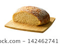 Sliced round of wheat rustic bread with sourdough, on cutting board , isolated on white background. 142462741