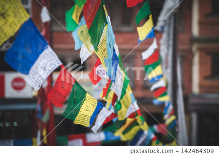 Colorful Prayer Flags Fluttering in Kathmandu Colorful Prayer Flags Fluttering in Kathmandu 142464309