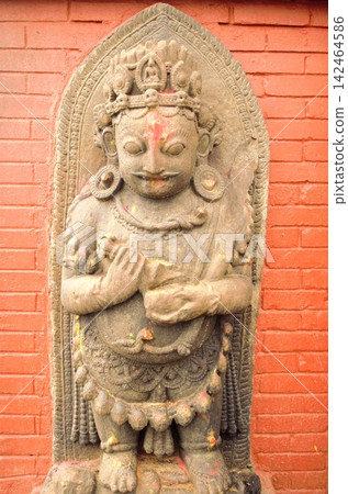 Ancient stone statues of deities at Swayambhunath Temple, Kathmandu, Nepal Ancient stone statues of deities at Swayambhunath Temple, Kathmandu, Nepal 142464586