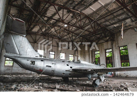Abandoned Aircraft in Decaying Hangar Abandoned Aircraft in Decaying Hangar 142464679