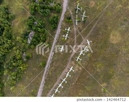 Aerial View of Abandoned Aircrafts on Grass Field Aerial View of Abandoned Aircrafts on Grass Field 142464712