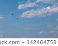 Aerobatic team of ultralight monoplanes flying 142464759