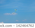Flying kite with colorful design close-up in sky 142464762