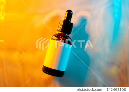 Cosmetic serum dropper bottle with blank label Cosmetic serum dropper bottle with blank label 142465108