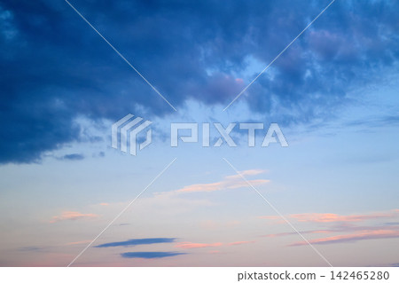 gentle pink sunset with light clouds in the sky gentle pink sunset with light clouds in the sky 142465280