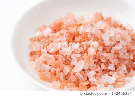 Close-up of crushed pink Himalayan rock salt in a dish Close-up of crushed pink Himalayan rock salt in a dish 142466354