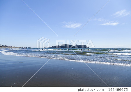 Enoshima Island as seen from the shoreline of Kugenuma Beach in Shonan. Enoshima Island as seen from the shoreline of Kugenuma Beach in Shonan. 142466675