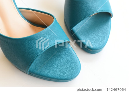 green high heels shoes on white background green high heels shoes on white background 142467064