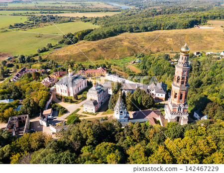 Drone view of the ancient St. John the Theologian Monastery in the village of Poshupovo Drone view of the ancient St. John the Theologian Monastery in the village of Poshupovo 142467229