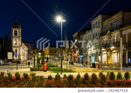 Evening view of illuminated Carvalho Araujo Avenue in Vila Real, Portugal Evening view of illuminated Carvalho Araujo Avenue in Vila Real, Portugal 142467416