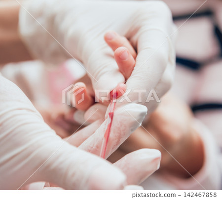 Nurse taking a little child blood sample. Medical equipment. Nurse taking a little child blood sample. Medical equipment. 142467858