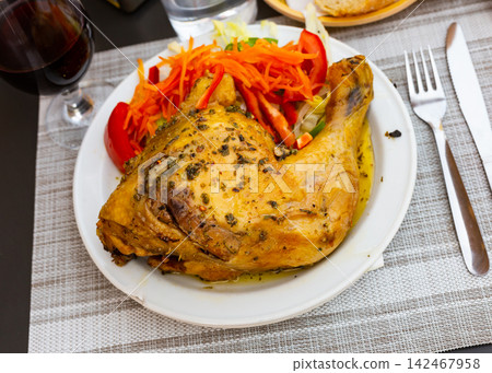 Grilled chicken leg and mixed vegetable salad Grilled chicken leg and mixed vegetable salad 142467958