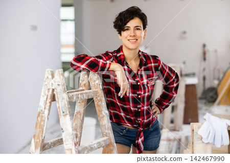 Portrait of attractive woman inside construction site 142467990
