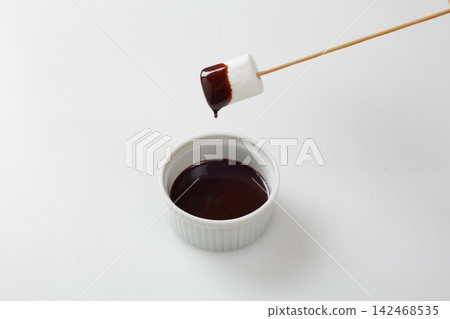 Marshmallow chocolate fondue Marshmallow chocolate fondue 142468535