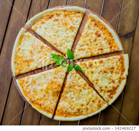 Large pizza Large pizza 142469227