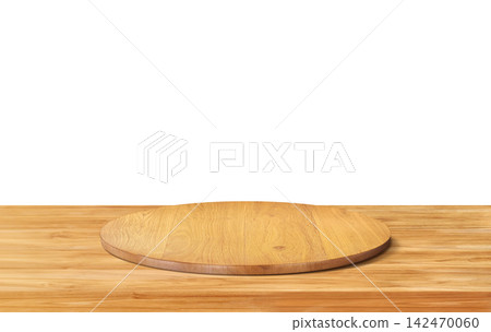 Round wooden podium on timber table for product display. 142470060