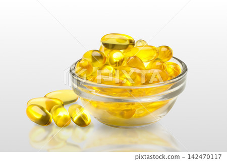Omega 3. Colorful omega fish oil capsules fill glass bowl on white background. Omega 3. Colorful omega fish oil capsules fill glass bowl on white background. 142470117