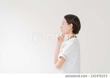 Salon staff with thoughtful expressions Salon staff with thoughtful expressions 142470253
