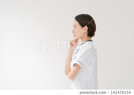 Salon staff with thoughtful expressions Salon staff with thoughtful expressions 142470254