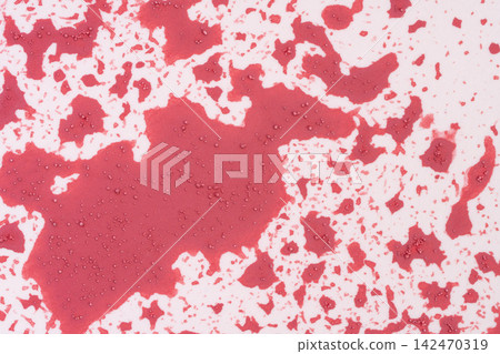 A seasonal background with red spots of varying sizes spread across it. A seasonal background with red spots of varying sizes spread across it. 142470319