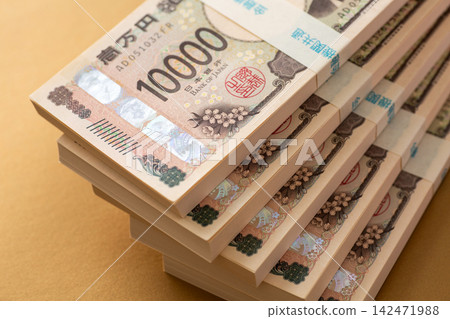 A stack of banknotes worth 5 million yen A stack of banknotes worth 5 million yen 142471988