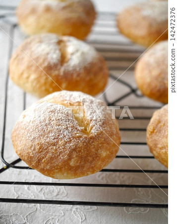 Freshly baked mini French bread Freshly baked mini French bread 142472376