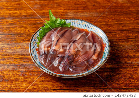 A rich and flavorful pickled firefly squid that pairs perfectly with sake. A rich and flavorful pickled firefly squid that pairs perfectly with sake. 142472458