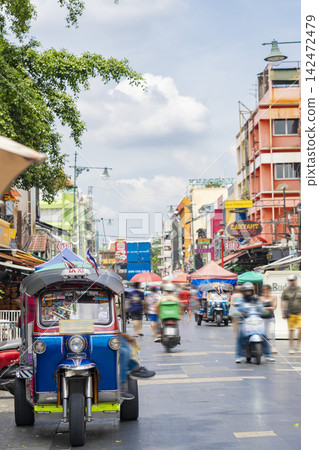 The bustling Khao San Road in Bangkok, Thailand, and a parked tuk-tuk. 142472479
