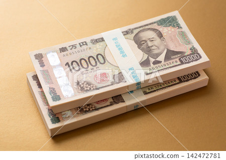 A stack of banknotes worth 2 million yen A stack of banknotes worth 2 million yen 142472781