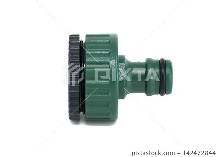 Green plastic garden hose connector with black threaded coupling on white background Green plastic garden hose connector with black threaded coupling on white background 142472844