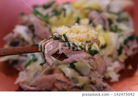Spoonful of Rice and Meat Dish Close-up Spoonful of Rice and Meat Dish Close-up 142473042