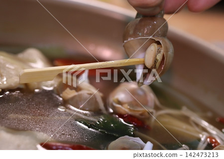Snail in Hot Pot with Bamboo Stick Snail in Hot Pot with Bamboo Stick 142473213