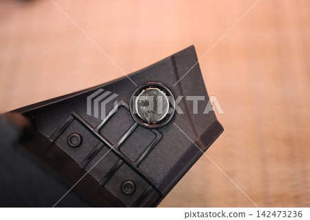 Close-Up of Mechanical Component with Button Close-Up of Mechanical Component with Button 142473236