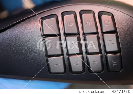 Close-Up of Computer Mouse Buttons with Numbered Keys Close-Up of Computer Mouse Buttons with Numbered Keys 142473238