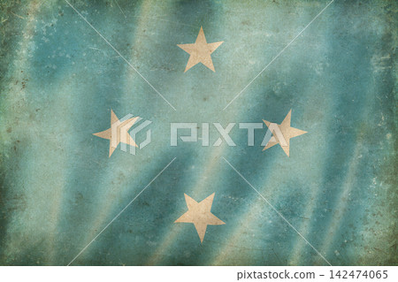 Old vintage flag of Micronesia, worn and stained 142474065