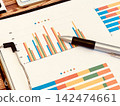 Bar graph data and ballpoint pen 142474661