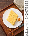 Japanese-style egg dish: Rolled omelet with dashi broth, served with grated daikon radish. Japanese-style egg dish: Rolled omelet with dashi broth, served with grated daikon radish. 142475152