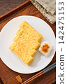 Japanese-style egg dish: Rolled omelet with dashi broth, served with grated daikon radish. Japanese-style egg dish: Rolled omelet with dashi broth, served with grated daikon radish. 142475153