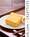 Japanese-style egg dish: Rolled omelet with dashi broth, served with grated daikon radish. Japanese-style egg dish: Rolled omelet with dashi broth, served with grated daikon radish. 142475155