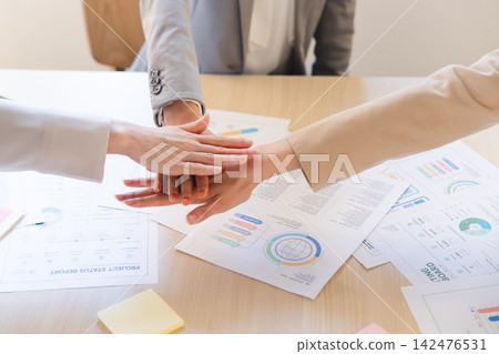 The hands of united businesswomen The hands of united businesswomen 142476531